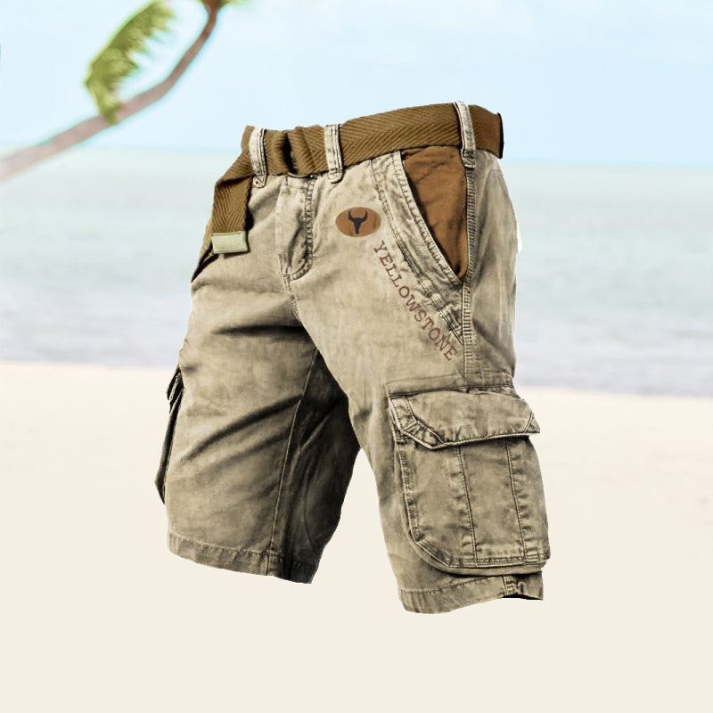  Male model standing in casual multi-pocket cargo shorts on a plain background.