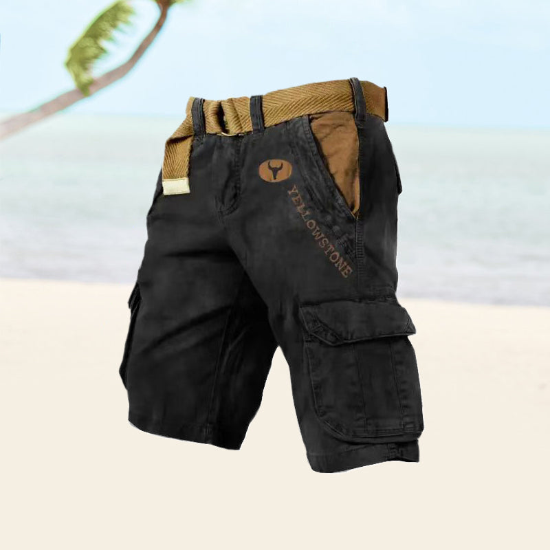  Male model showcasing utility cargo shorts with a relaxed fit against a plain background.