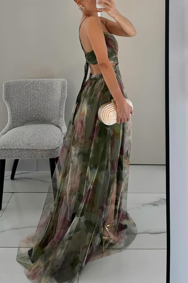 Female model in an elegant maxi dress on a clean background.