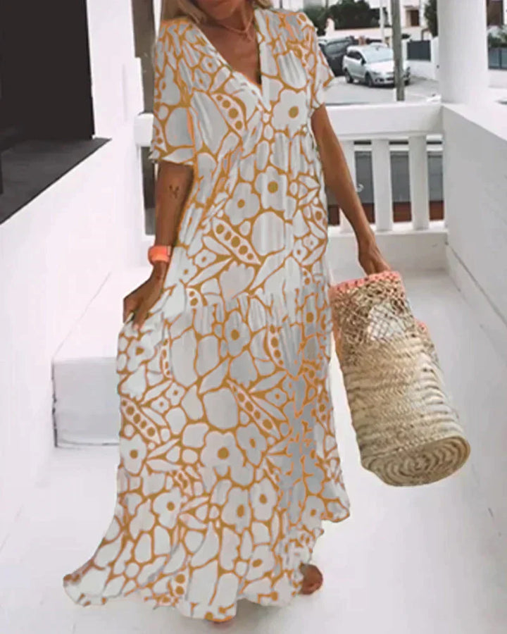 Lightweight long dress with soft drape and flattering waist detail.