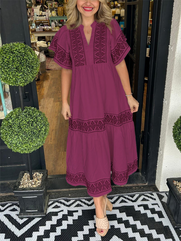 Female wearing a relaxed-fit boho dress with airy movement.