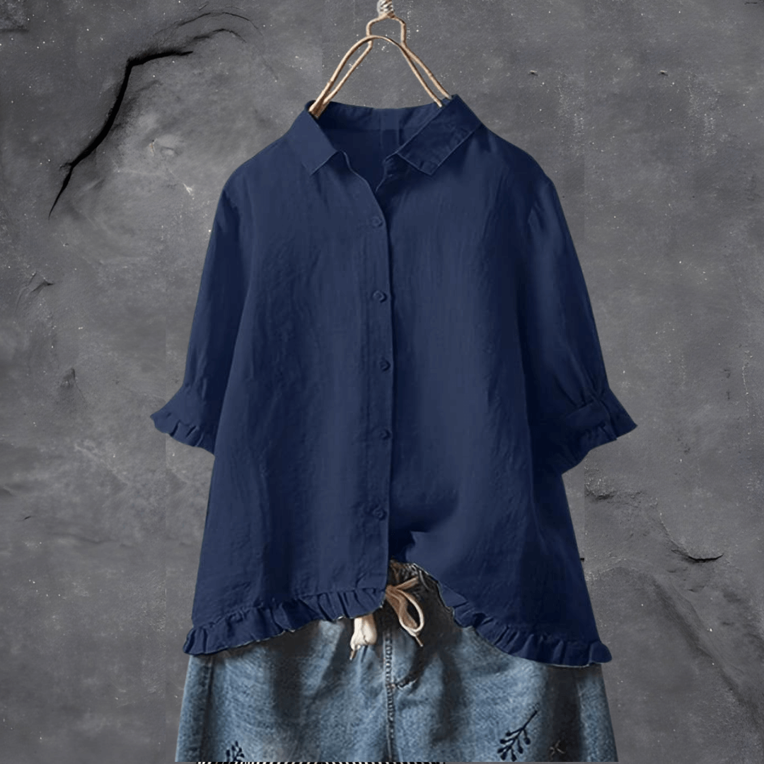 Elegant women’s lightweight blouse on a clean background with a softly flowing relaxed silhouette.