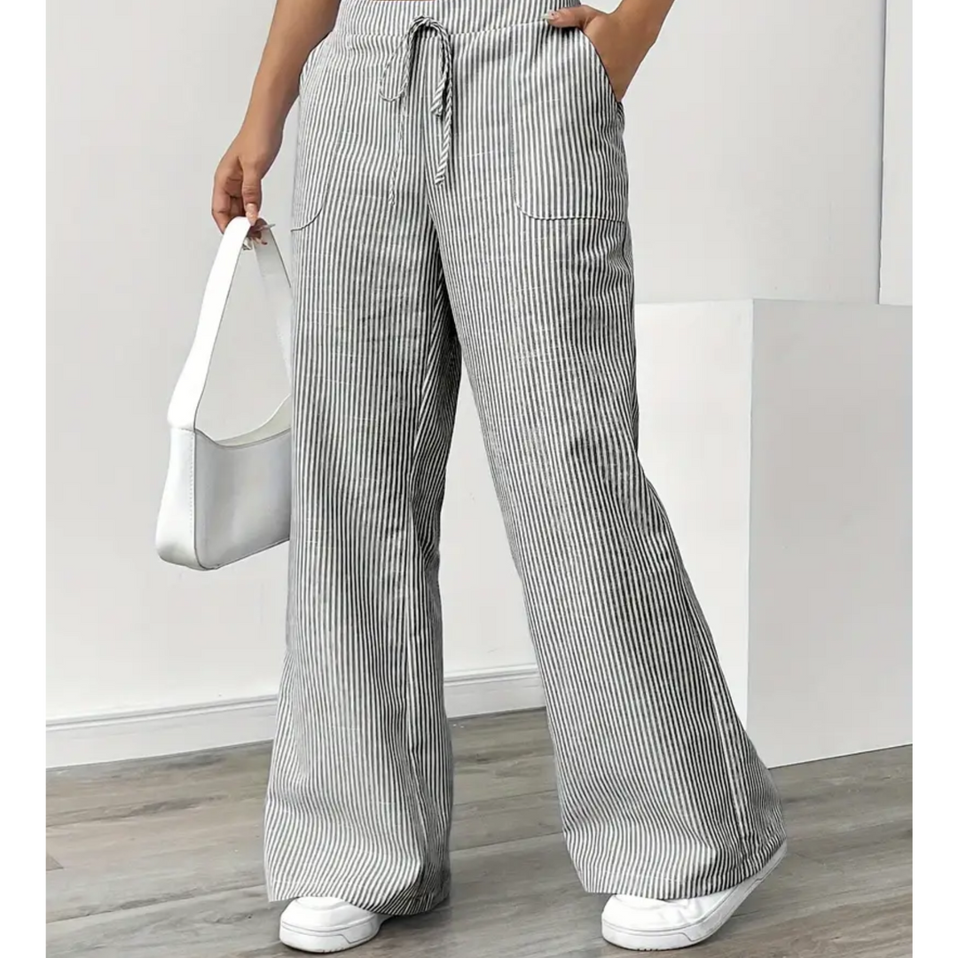 Flattering vertical stripe pants with pockets shown on a plain background.