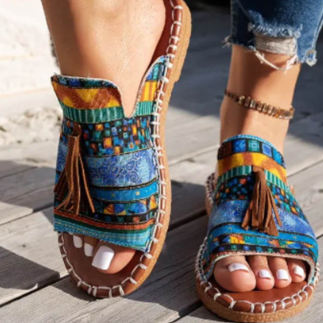 Lightweight bright sandals with cushioned footbed shown on a plain background.