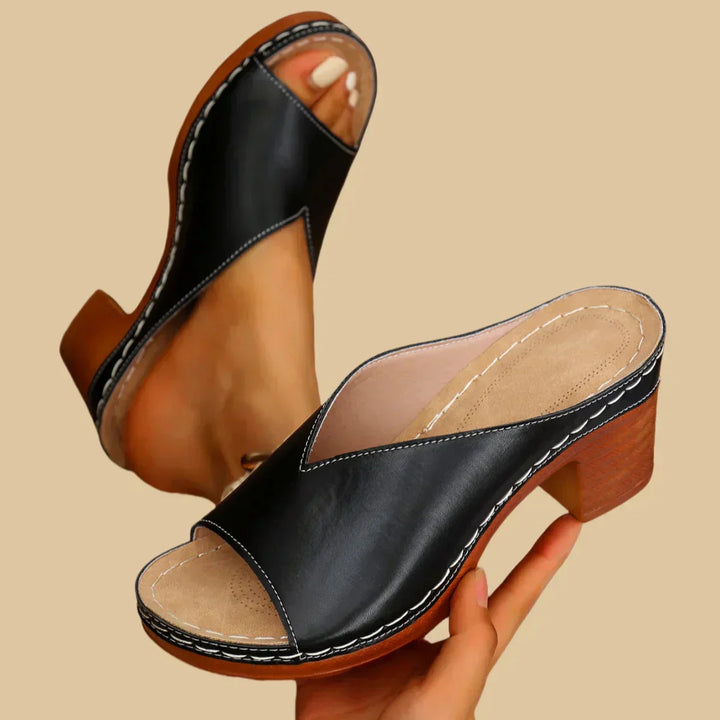 Foot in lightweight open-toe sandal for daily wear.