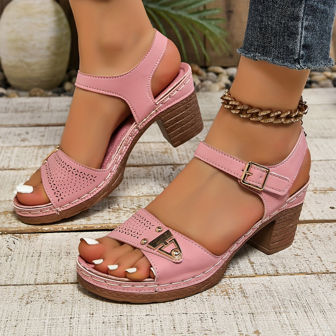 Classic women’s sandals displayed clearly on a plain background.