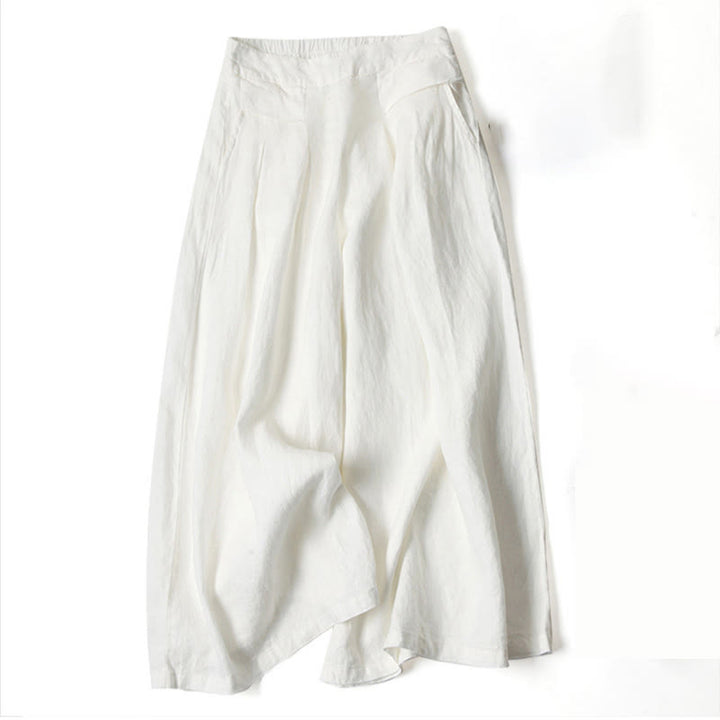 Flowing wide-leg pants for women shown on a simple plain background.