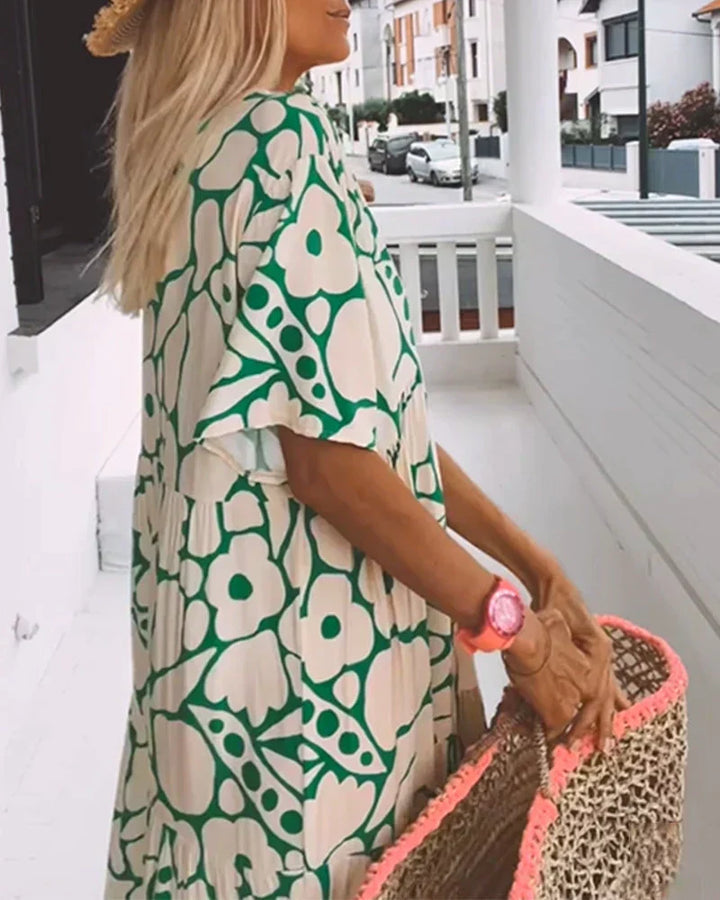 Relaxed fit maxi dress designed with a graceful silhouette and soft movement.