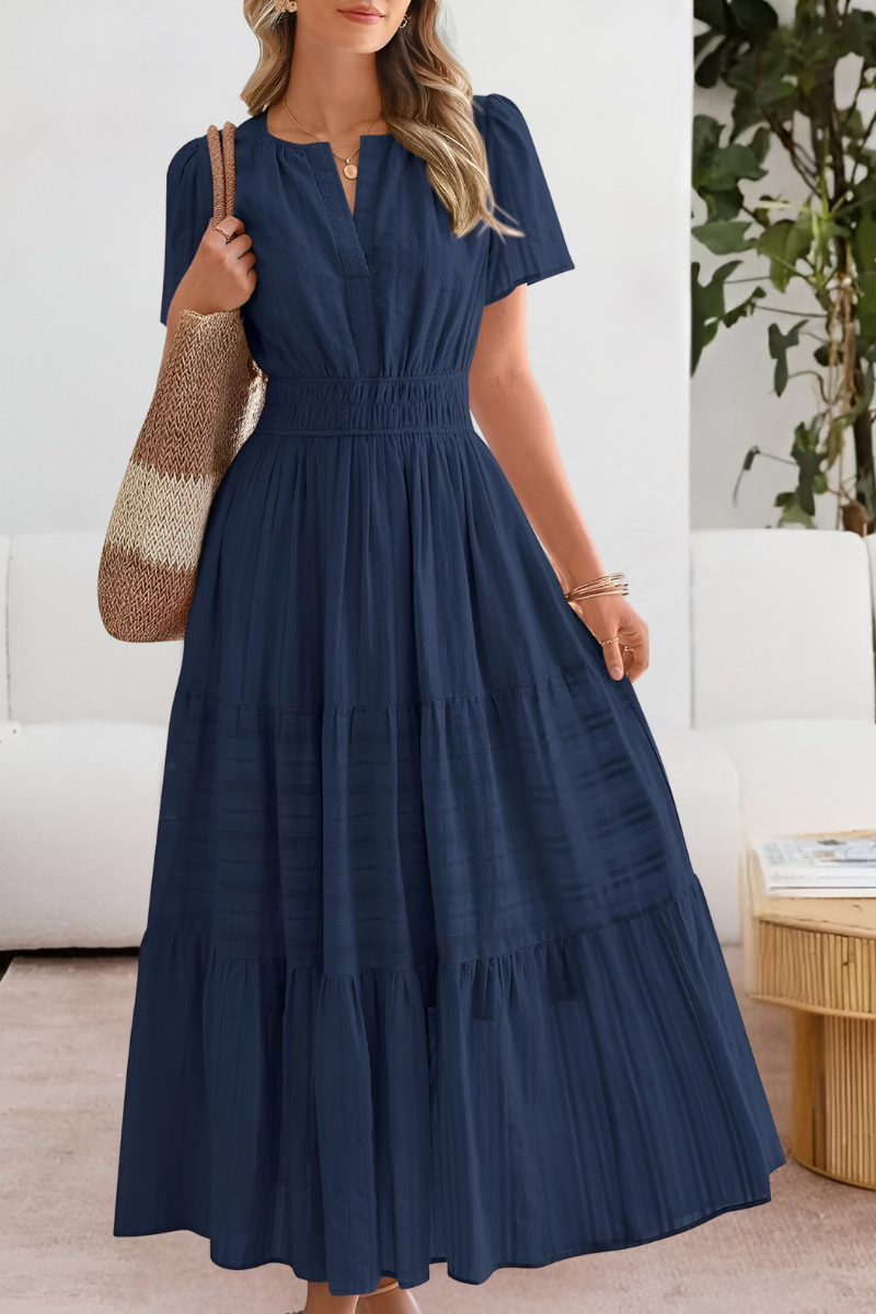 Sleeveless boho-inspired maxi dress displayed on a plain background.