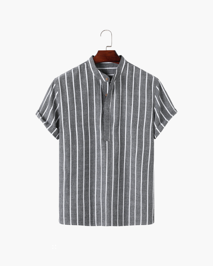 A horizontal striped polo shirt with an open neck detail on a plain background.