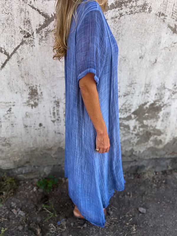 Female model wearing a versatile evening and casual long dress.