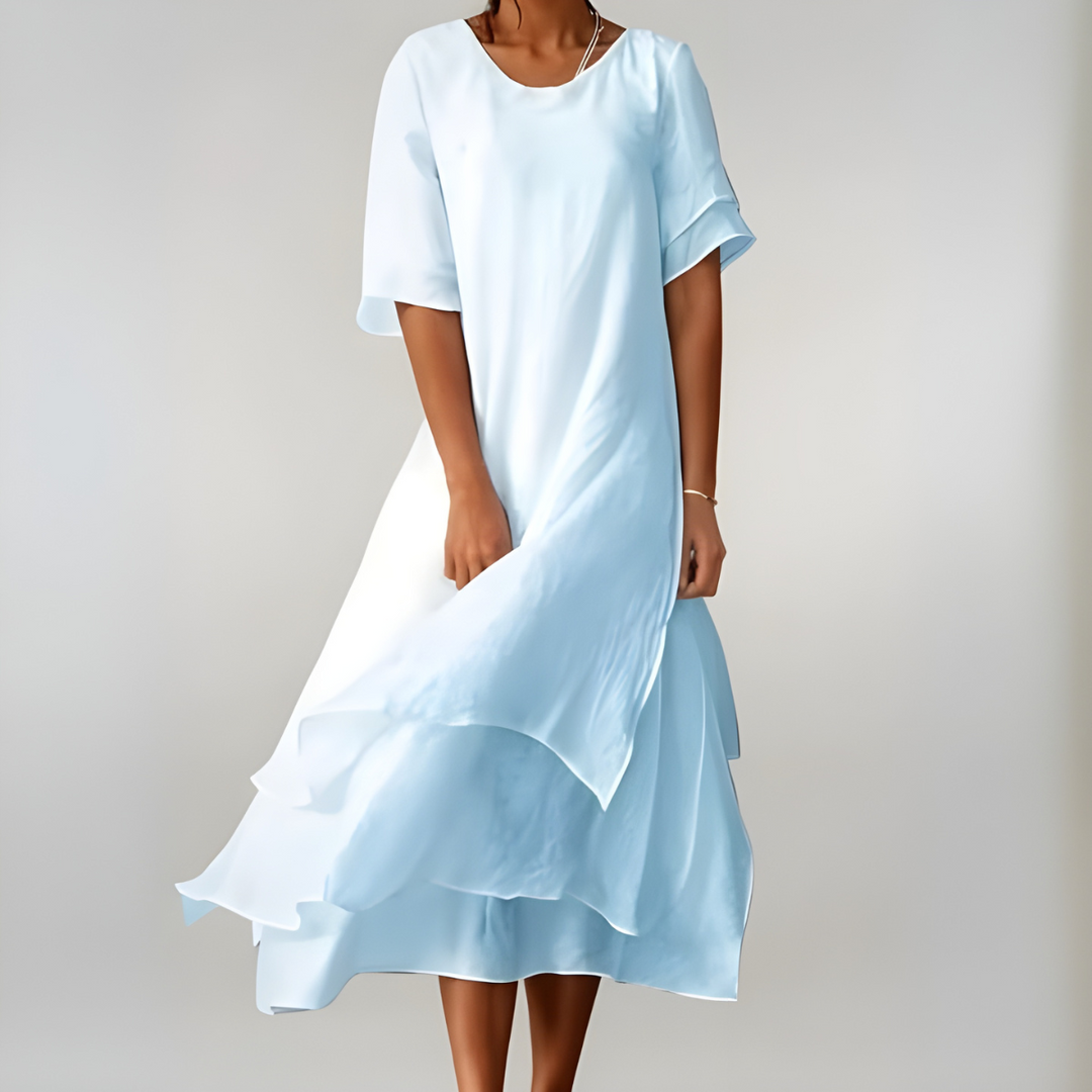 Airy maxi dress perfect for warm days and refined casual occasions.