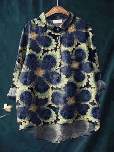 Elegant floral blouse worn on a clean background.
