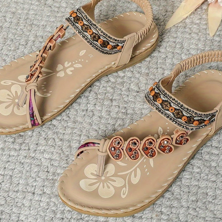 Eegant boho sandals on plain background