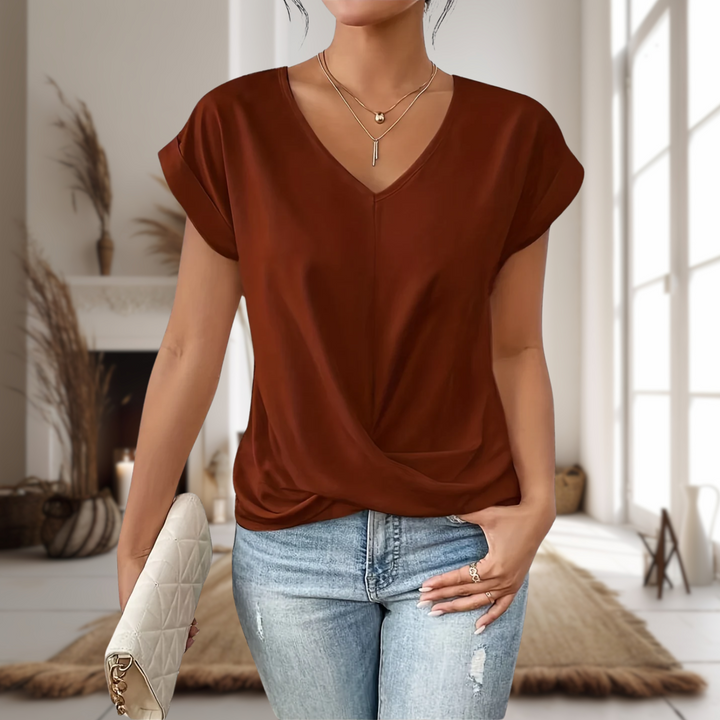 Breathable sweetheart neck top displayed on a model against a plain background.