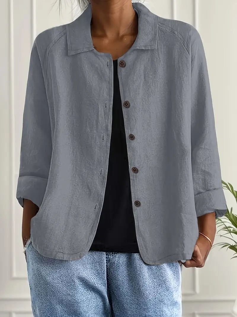 Classic women’s blouse styled on a clean background with a comfortable airy design.