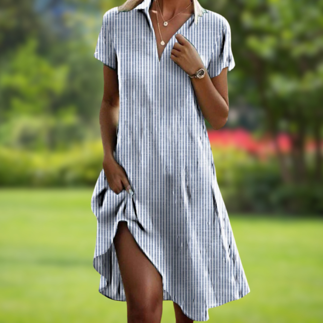 Stylish women’s dress displayed against a plain background with a polished modern look.