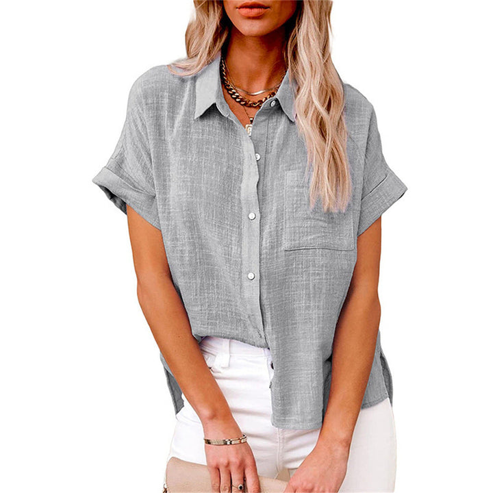 Female figure wearing a flattering relaxed-fit shirt against a plain background.