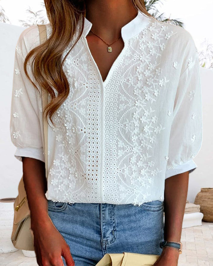 Close-up front angle showing puff sleeves and lace detailing.
