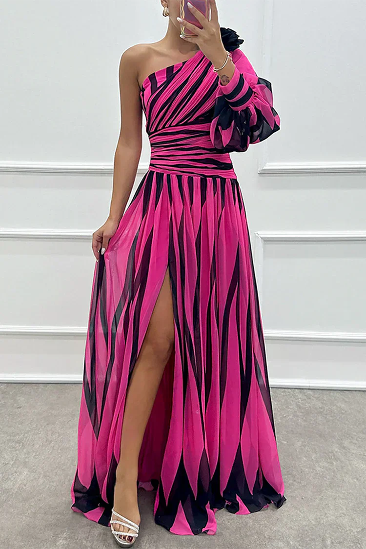 Model wearing a chic one-shoulder maxi dress against a clean background.