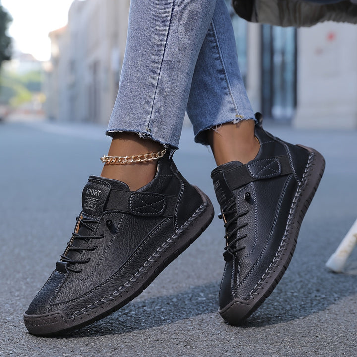 Female model showing lightweight walking shoes styled with everyday clothing.
