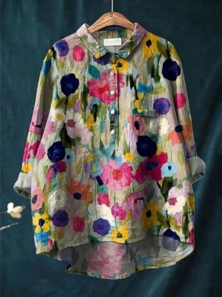 Soft flowing floral blouse against a clean background.