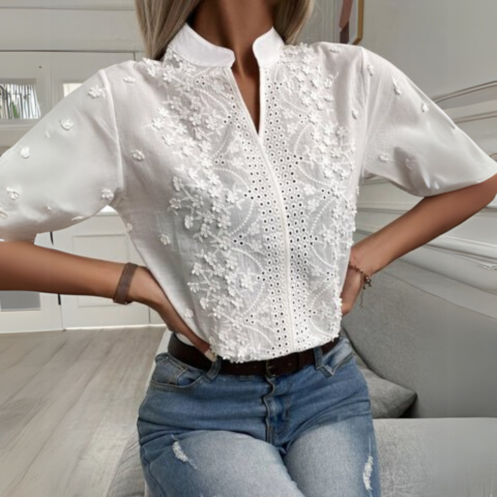 Lightweight refined blouse displayed on a wearer with a clean background.