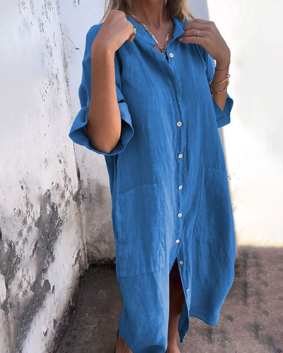 Relaxed bohemian dress styled with a model against a clean background.
