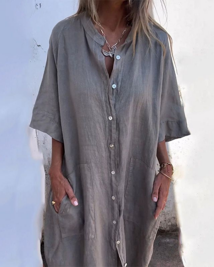 Boho shirt dress shown with a model against a clean background.