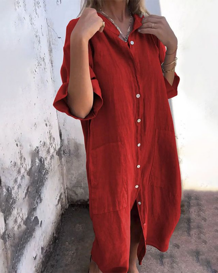 Lightweight women’s dress displayed with a model against a plain background.