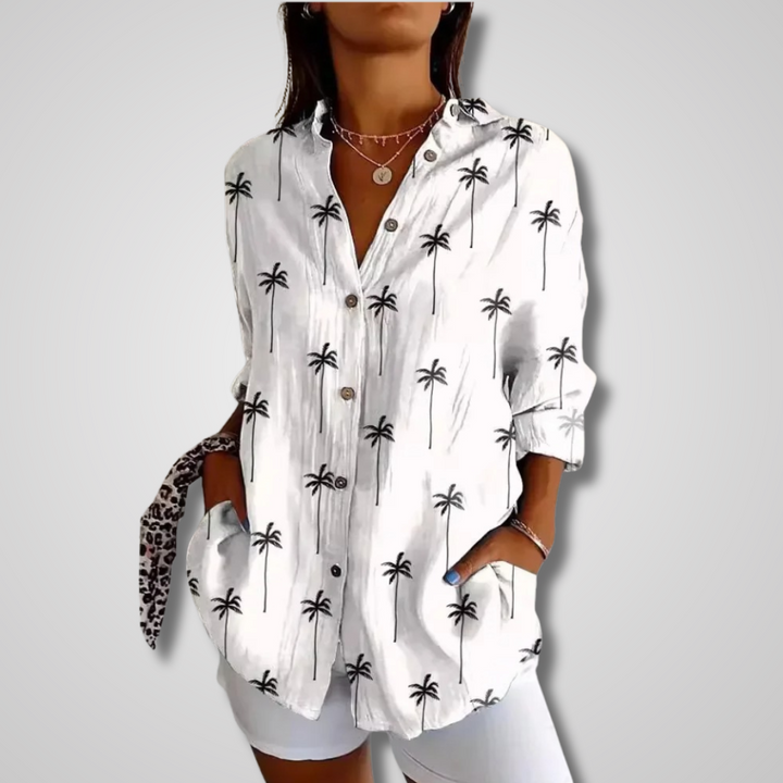 Soft breathable women’s casual shirt w/ model on a clean background.