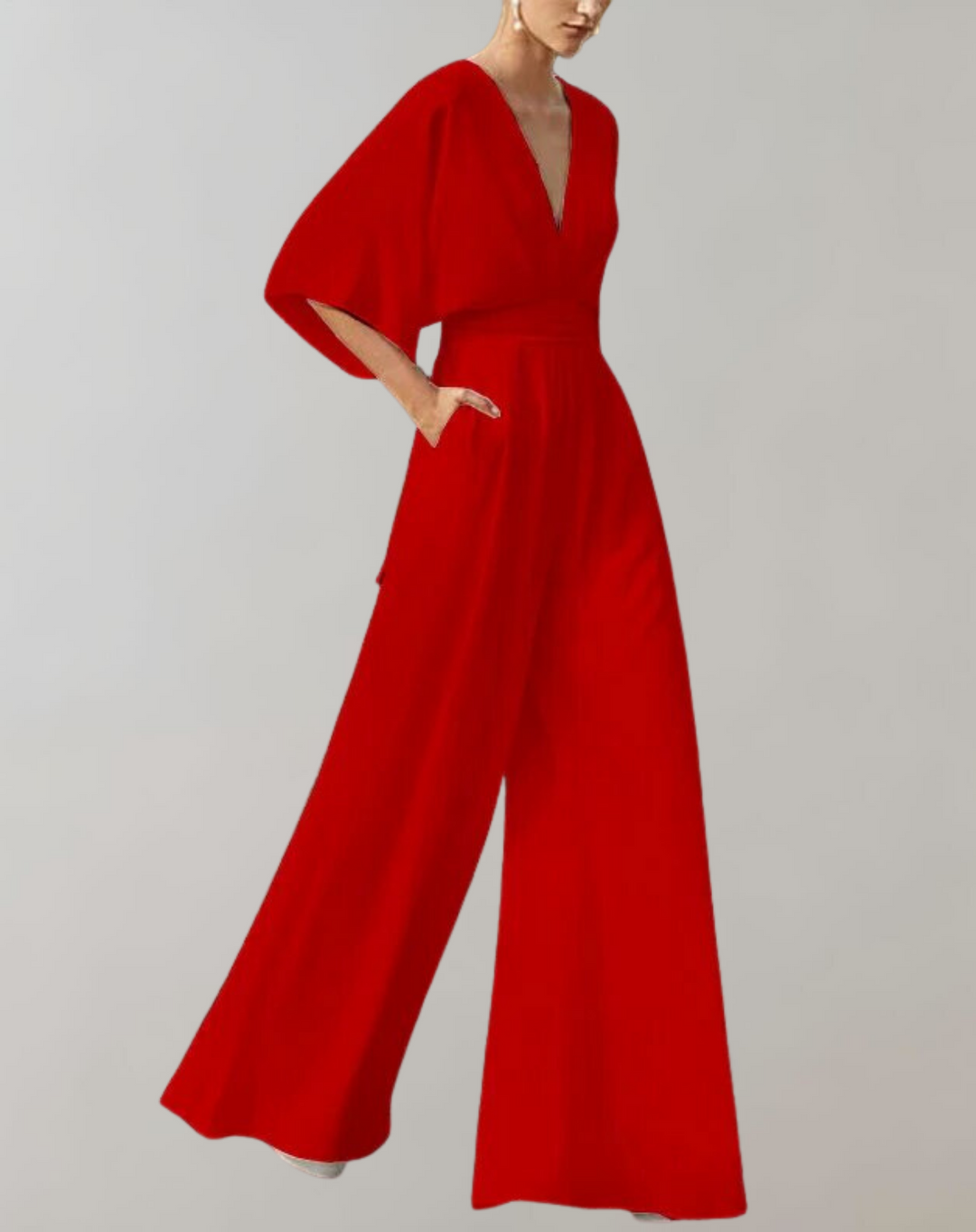 Wide-leg evening jumpsuit displayed on a female model with a clean studio background.