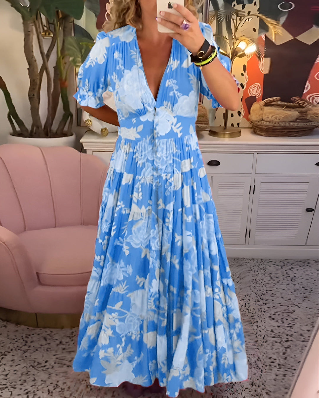 Elegant floral dress featuring short sleeves and a flattering neckline.