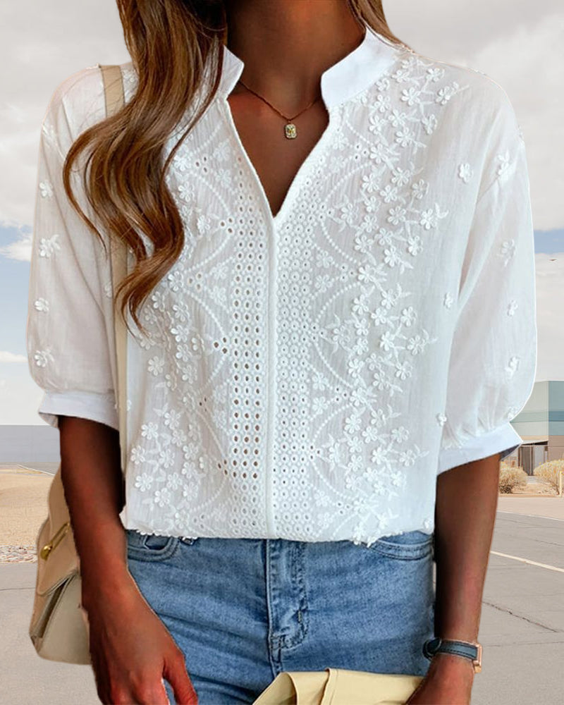 Front view of elegant blouse on plain background.