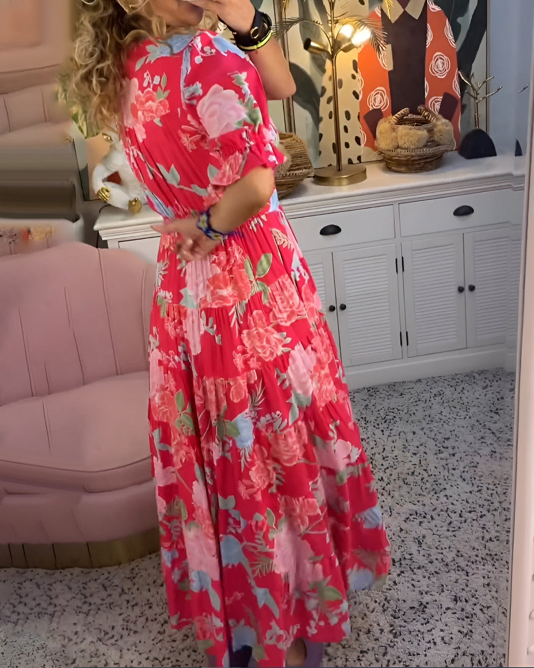 Lightweight floral dress with a relaxed silhouette styled for everyday wear.