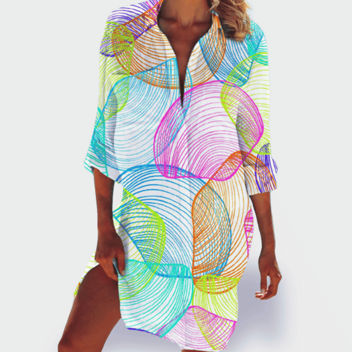 Vibrant printed dress designed for easy warm-weather elegance.