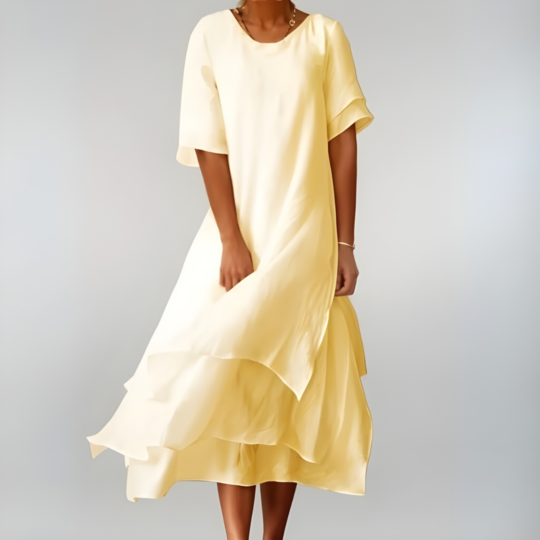 Elegant long dress with a soft drape and flattering relaxed fit.