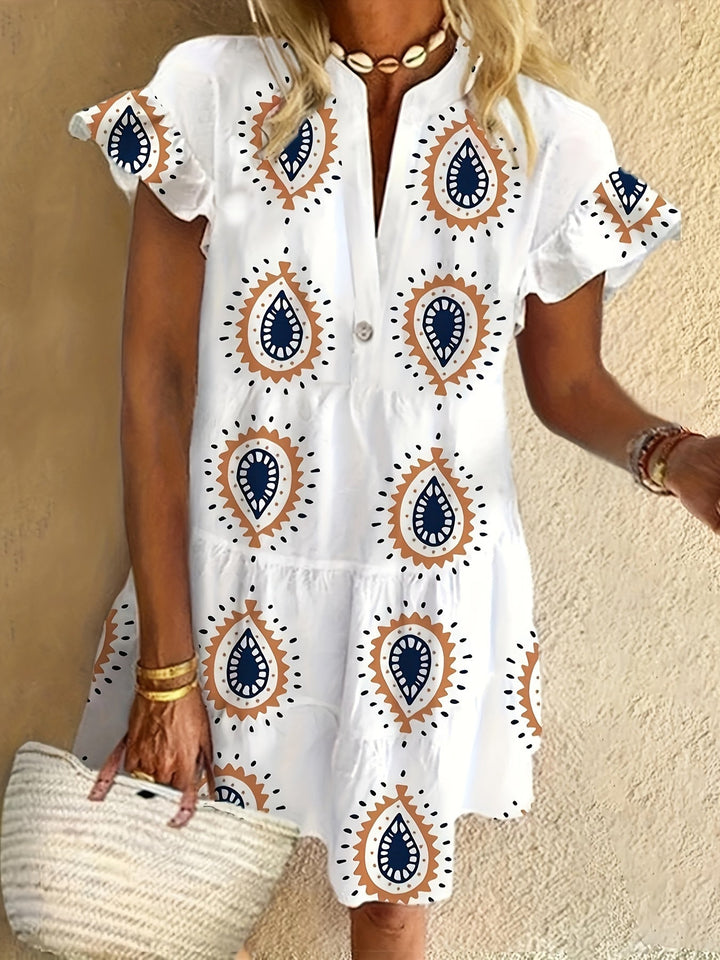 Elegant bohemian midi dress shown on a clean plain background.