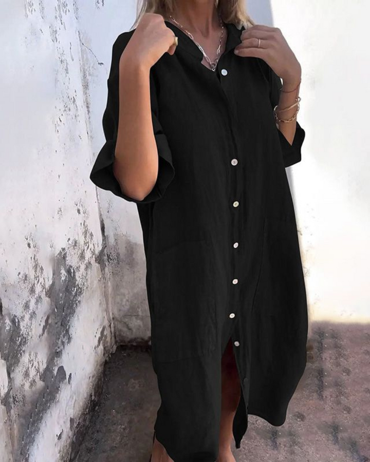 Flattering women’s shirt dress displayed with a model on a plain background.