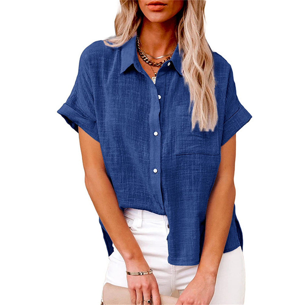 Woman in a polished casual shirt with relaxed silhouette on a clean background.