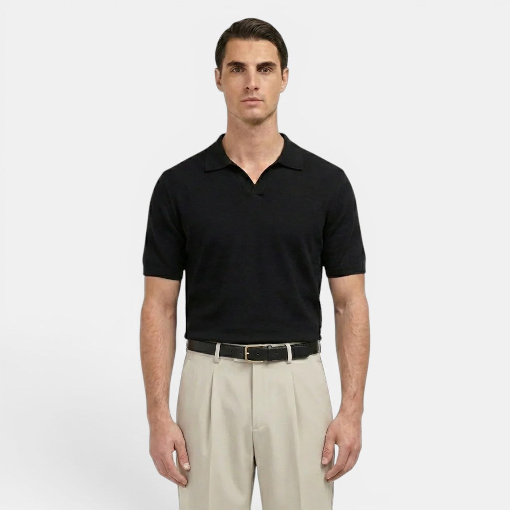 Male model wearing pleated straight leg trousers on a plain background.