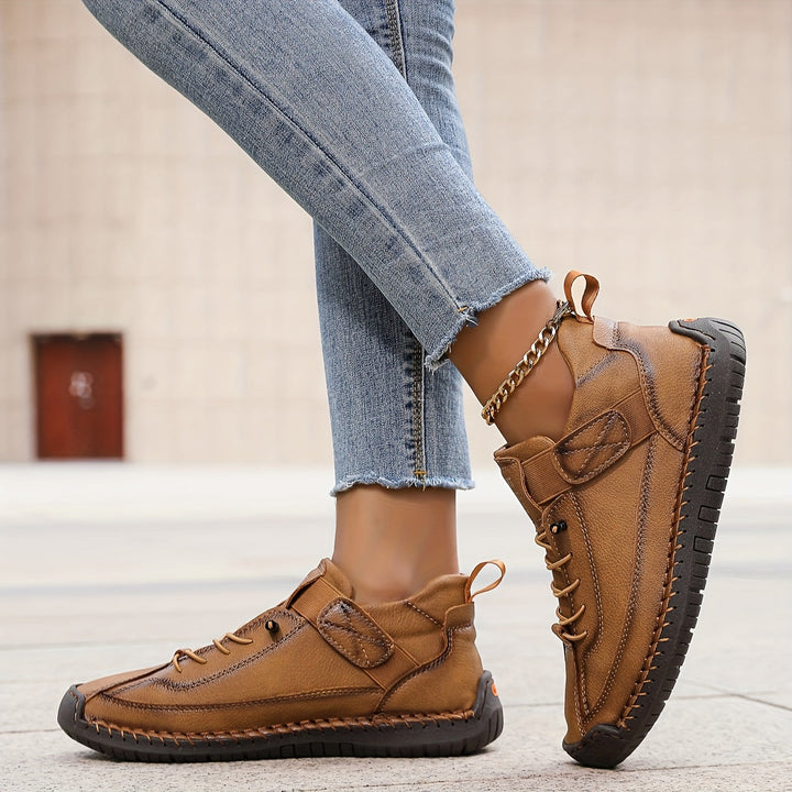 Woman wearing cushioned slip-on sneakers for casual daily outfits.