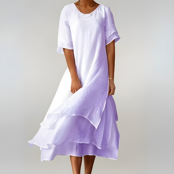 Feminine flowing dress with a timeless shape and comfortable feel.