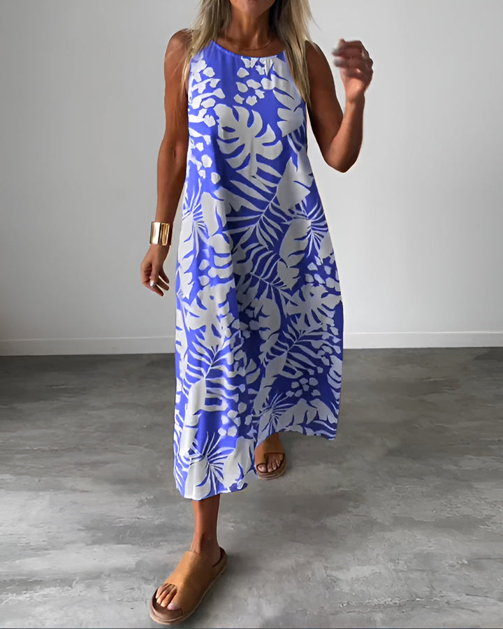 Feminine long dress with a waist-defining fit and polished occasion-ready look.