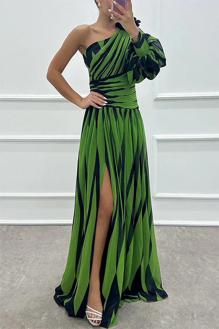 Model wearing a lightweight striped maxi dress against a plain background.