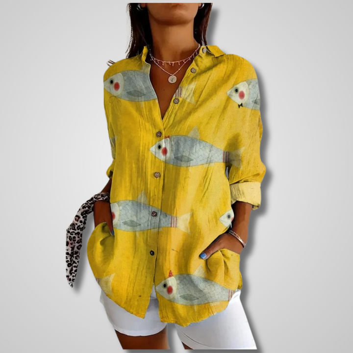 Timeless vintage women’s shirt w/ model on a plain background.