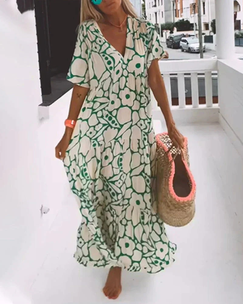 Flowing casual dress with feminine shape and effortless everyday appeal.
