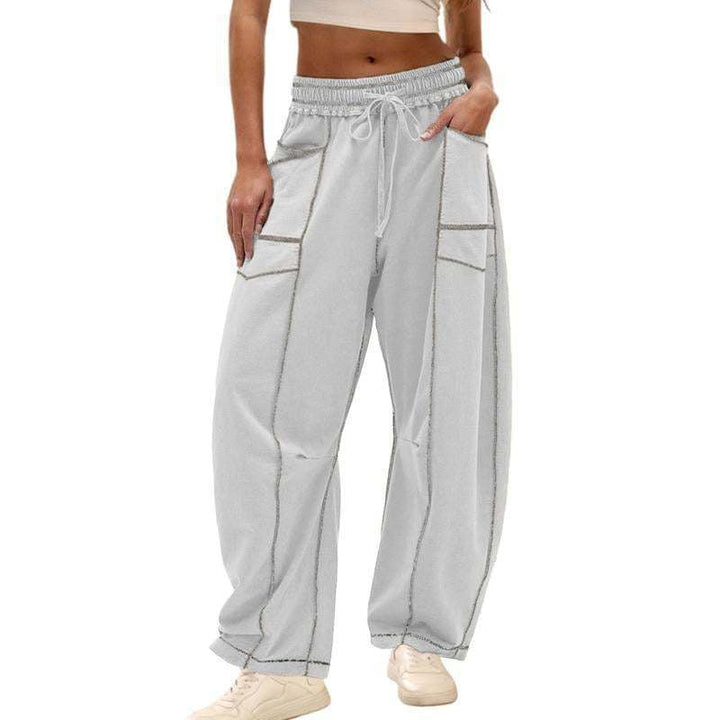Female model in roomy cargo pants styled for everyday wear.