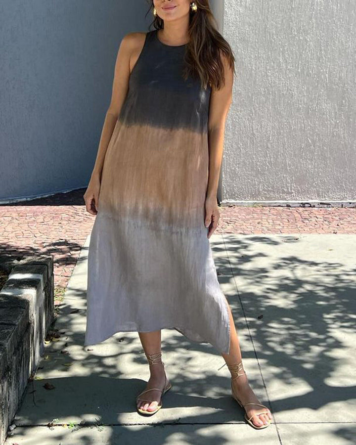 Elegant gradient sleeveless dress designed for a flattering elongated look.