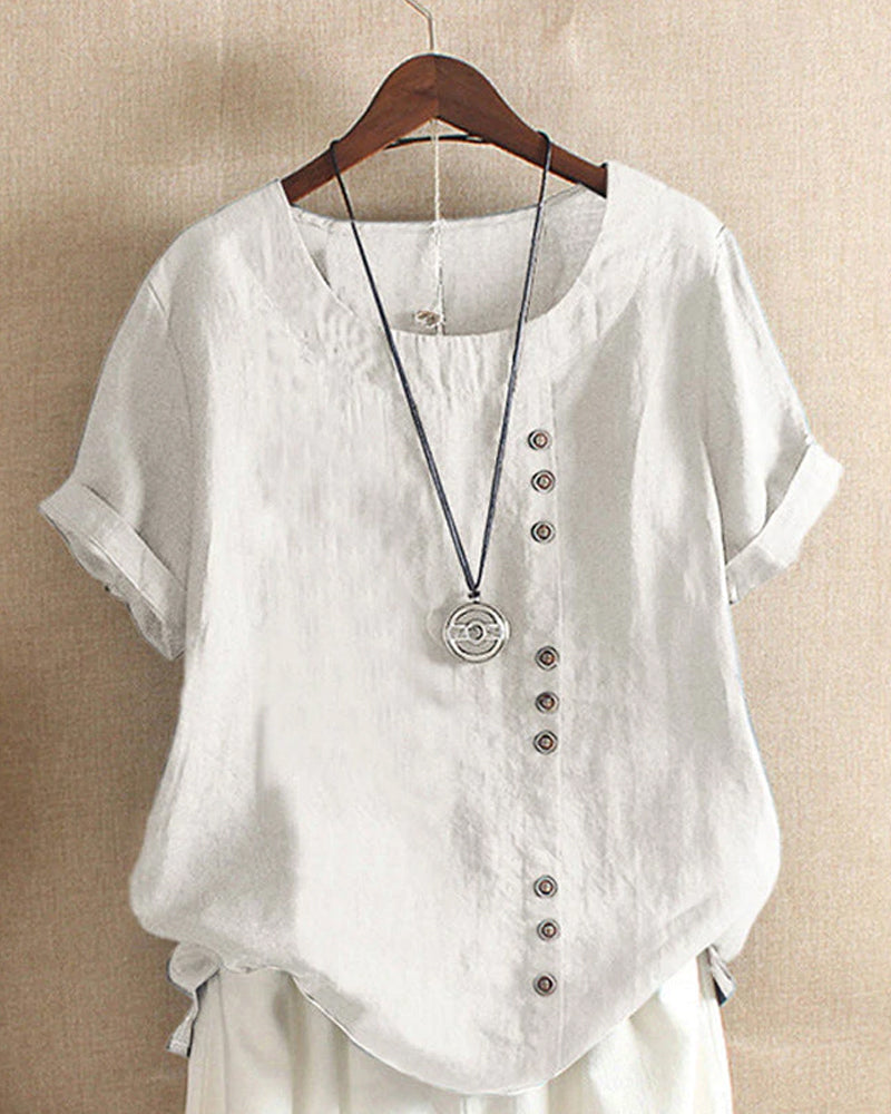 Loose long sleeve linen blouse shown from front angle.